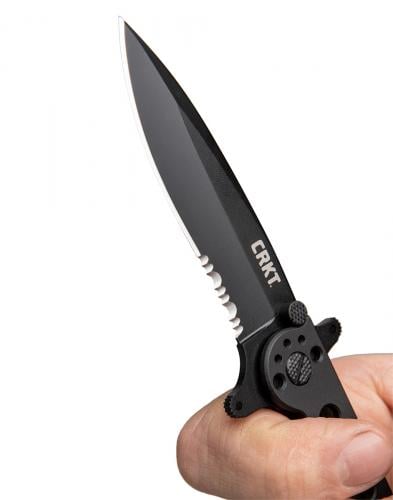 CRKT M21-10KSF Folding Knife. The black oxidized combination blade comes with a powerful deep-bellied spear point.