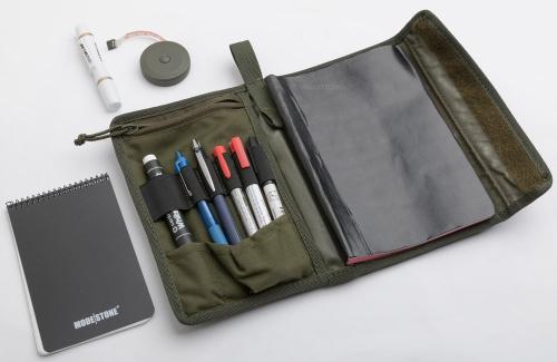 Särmä TST Map Pouch. This user setup is for a marksman who journals shooting sessions to the larger notebook and carries a lens-cleaner, sharpies, waterproof notebook, and sharpies and pencils.