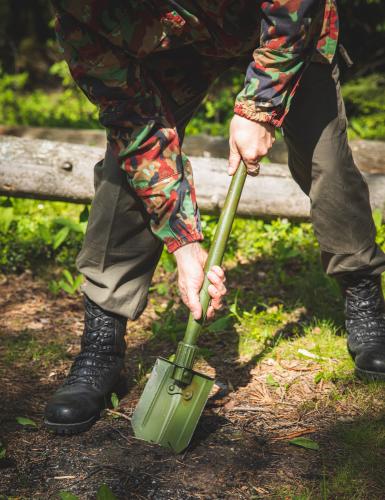 Danish M-1943 Style E-tool, Surplus. You can, for example, dig with this thing.