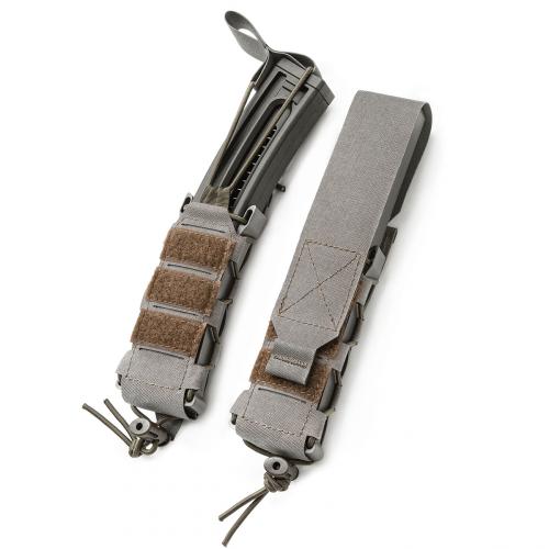 Särmä TST PCC Magazine Pouch. The elastic cord can be secured at the centerline or to the side. The flap is adjustable.