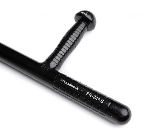 Monadnock PR-24 Police Baton, Surplus. This is he STS version that features the so-called Trumbull stop at the end of the side handle to keeps the baton better in your grip.