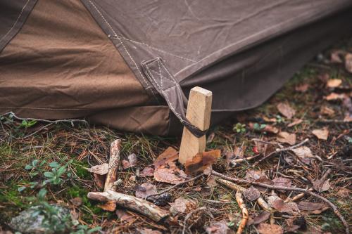 British 2-person WW2 Model Bivouac Tent, Surplus. Contains atmospheric but otherwise crappy pegs that can be improved with a knife. Well, until these run out but you can easily make better ones.