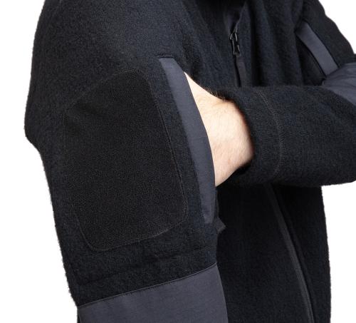 Särmä Men's Wool Fleece Jacket. Zippered pockets and hook & loop slots for patches on both sleeves.
