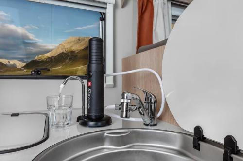 Katadyn Combi Microfilter. The Combi is equipped with the water tap kit that enables you to connect the filter to a tap in your kitchen, caravan, camper, or boat.