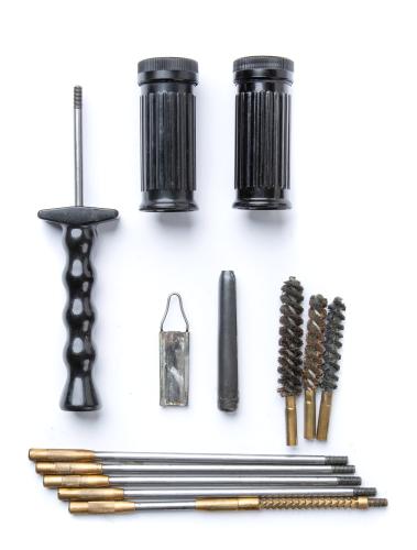Swiss SG510 Cleaning Kit, 7.62 mm, Surplus. The kit includes a swiveling T handle plus extension rods (one with a swiveling brass jag), three brass brushes, a chambering tool, 1 bore inspection mirror, and two grease pots.