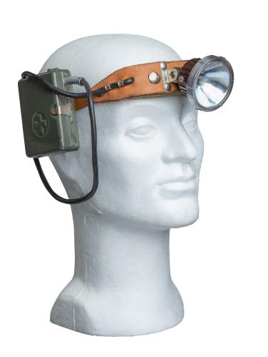 Swiss Headlamp, Surplus. "I am not a miner, but I can take a look."
