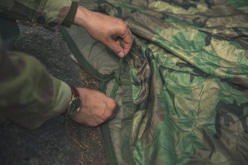 US "Woobie" Poncho Liner, Woodland, Surplus, Unissued. This is also compatible with British jungle sleeping bag.