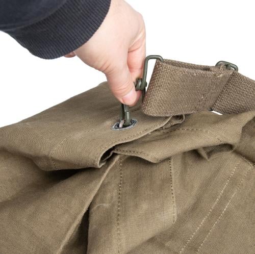 French Canvas Duffle Bag, Surplus. The closing mechanism includes the use of the strap hook.