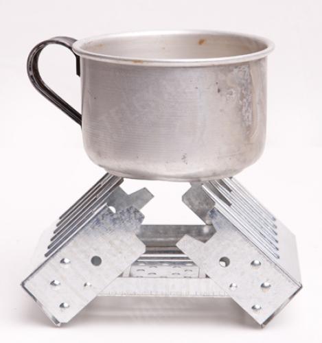 British Field Stove with Hexamine Tablets, Surplus. Pictured is a similar stove displaying the features.