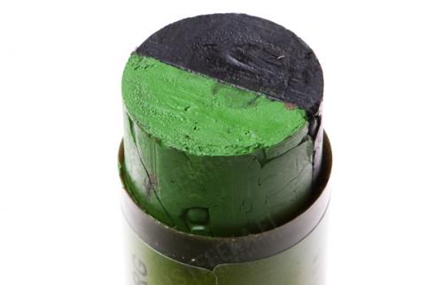 British camo face paint stick, green/black.