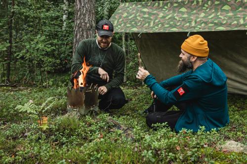 Särmä Merino Wool Hoodie. The model's (on the right) chest circumference is 110 cm and waist 97 cm, wearing size Large Regular.