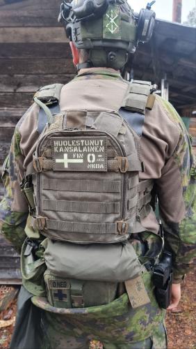 Velocity Systems Jacket Stash Pocket . Size X-Large FDF M13 Rain Jacket inside the Jacket Stash Pocket.